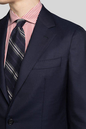 Shoulder, lapel and chest pocket details of Intrepid Twill Navy Suit